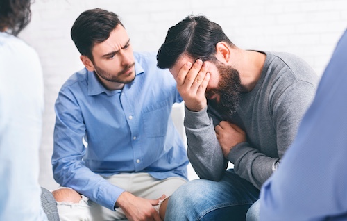 Man Crying in Rehab Meeting - Force Someone Into Rehab