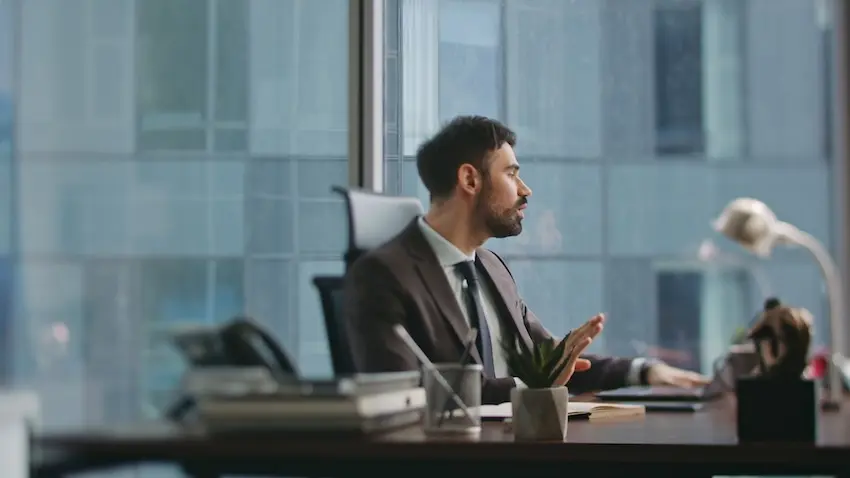 North Carolina employee preparing to discuss drug rehab leave with their employer at a workplace desk
