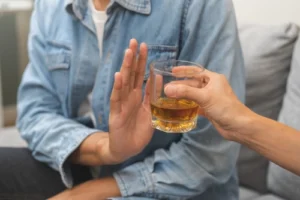 Individual coping with addiction in a rehab program designed for individual facing alcohol use disorder and the complex interplay of mental health, showcasing dual diagnosis treatment options for severe depression.